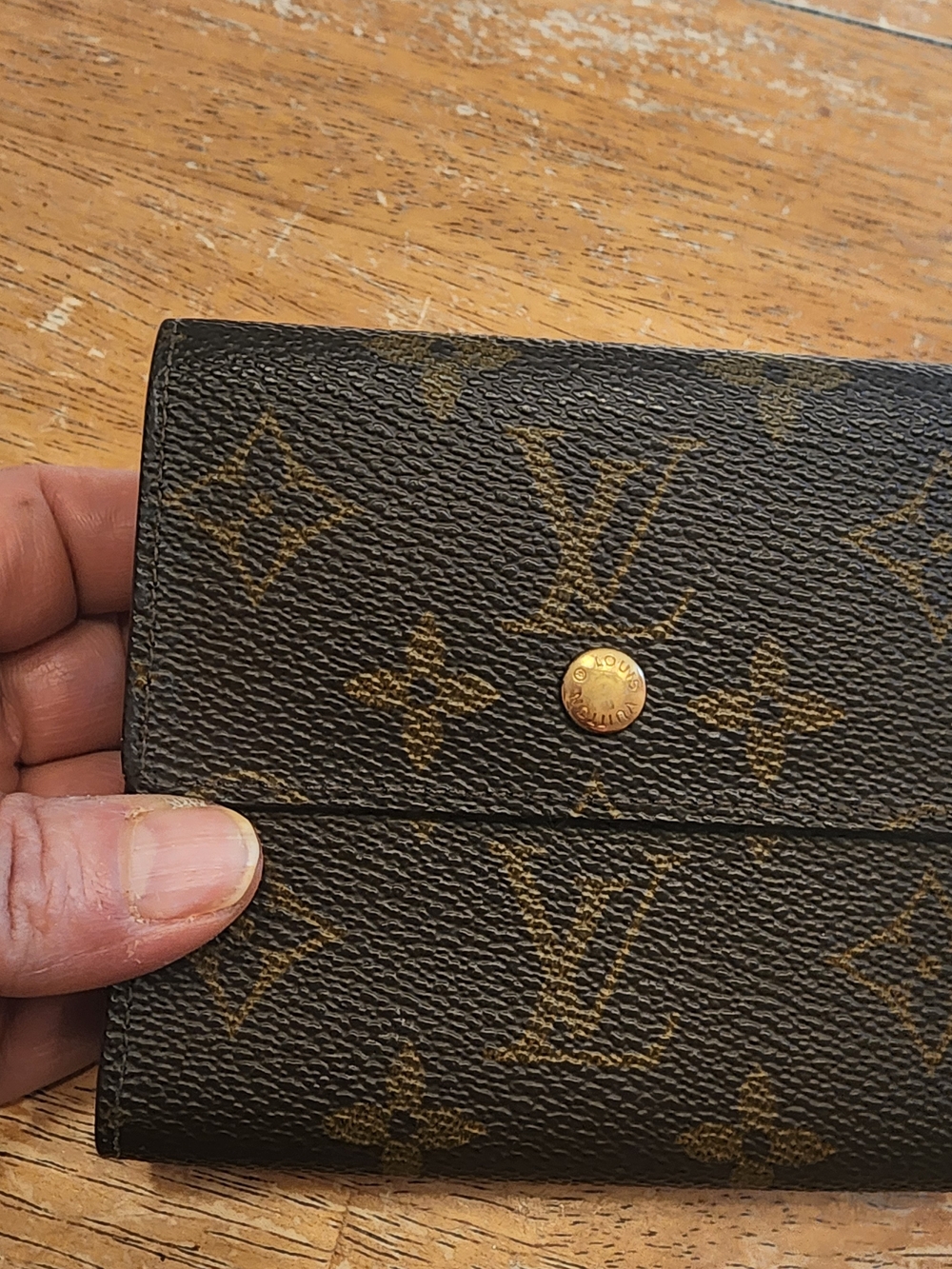 vintage Louis Vuitton Monogram Elise trifold wallet.